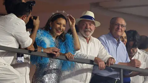 Getty Images Brazil's president Luiz Inácio Lula da Silva watching the show from the stands
