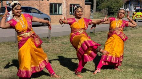 Dancers at an Onam festival in Cambourne, Cambridgeshire