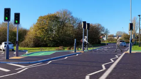 An illustration showing one person on a cycle and another person crossing at a pedestrian and cycle crossing. There are traffic signals. Trees and grass surround the road. There are cycle lanes. There are two cars.