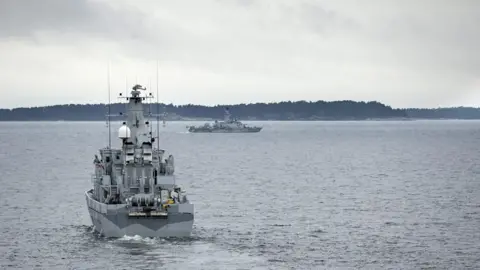 EPA Swedish minesweeper HMS Kullen (L) is engaged in a military operation in the Stockholm Archipelago, Sweden, 19 October 201