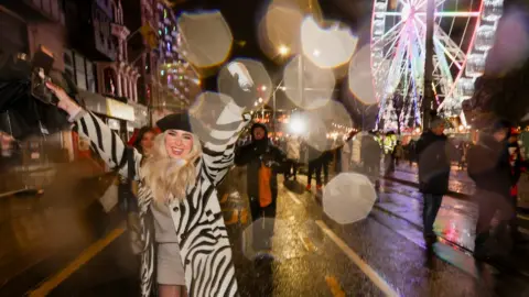 Reuters Revellers celebrate ahead of the New Year, in Edinburgh, Scotland, Britain December 31, 2022.