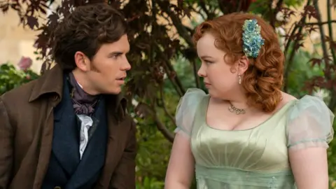 Netflix Colin Bridgerton (Luke Newton) and Lady Penelope Featherington (Nicola Coughlan)