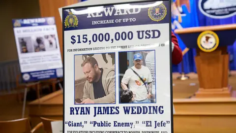 Sign showing $15m reward for Ryan James Wedding
