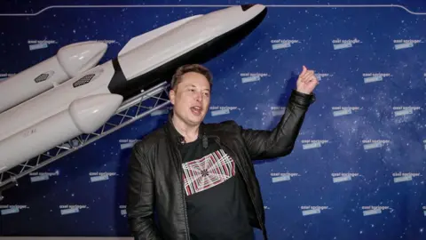 Getty Images SpaceX owner and Tesla CEO Elon Musk poses on the red carpet of the Axel Springer Award 2020 on December 01, 2020 in Berlin, Germany.