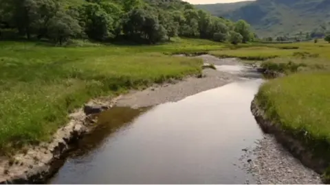 BBC / Silverback Films Gravel deposits at the sides of Swindale Beck