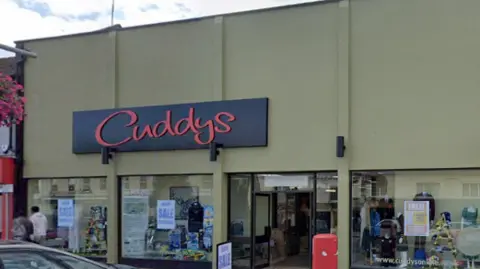 Google A screen shot of Cuddys department store from the outside