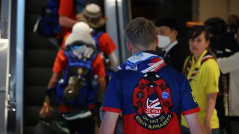 Reuters British scouts arriving at a hotel in Seoul, South Korea on 5 August