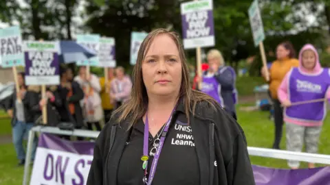 Kate Bradbrook / BBC Leanne Weatherly looking into the camera from the strike 