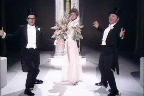 Angela Rippon dances with Ernie Wise & Eric Morecambe on the 1976 Morecambe and Wise Christmas show