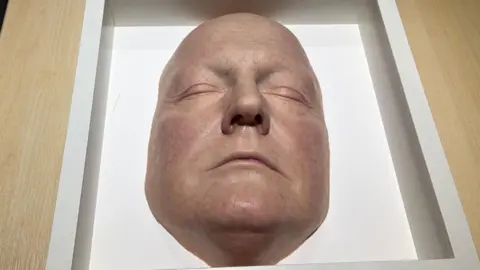 Darren Rozier/BBC A prosthetic face which has been moulded and painted to look like real skin. However, the item has been made out of silicon