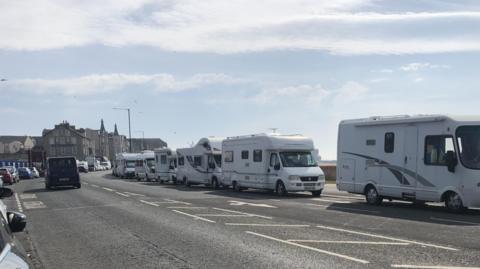 Motorhomes and campervans parked on Morecambe Prom