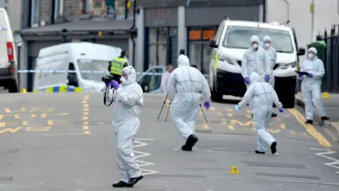 Wales News Service Forensic officers at the scene