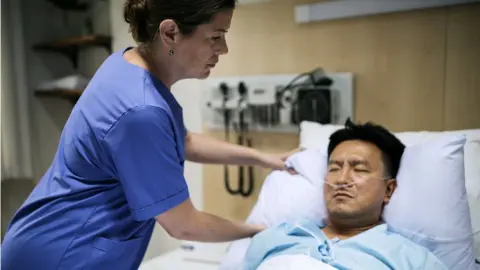 Getty Images Man in hospital bed