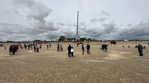 BBC Whale is hoisted off St Mary's Bay beach