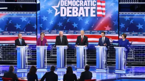 Getty Images Democratic presidential candidates (L-R) former New York City Mayor Mike Bloomberg, Sen. Elizabeth Warren (D-MA), Sen. Bernie Sanders (I-VT), former Vice President Joe Biden, former South Bend, Indiana mayor Pete Buttigieg and Sen. Amy Klobuchar (D-MN) (R) participate in the Democratic presidential primary debate at Paris Las Vegas on February 19, 2020 in Las Vegas