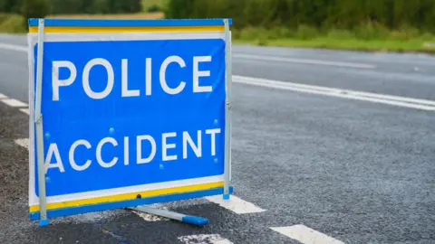 Getty Images British police accident sign at the side of the road. - stock photo