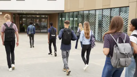 Getty Images Generic image of pupils on school walk