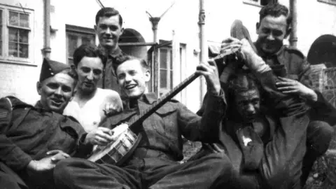North News / NNP Len GIbson with a banjo during the war years