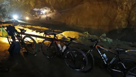 AFP Bicycles and backpacks from the boys outside the cave