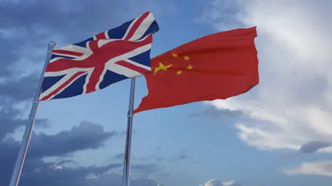 Getty Images Flags of the UK and China