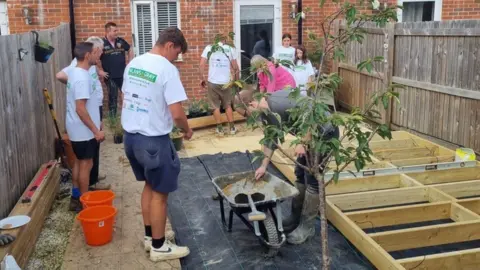 Family submission builders lay decking