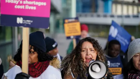 PA Media Nurses on the picket line in Birmingham on 6 February