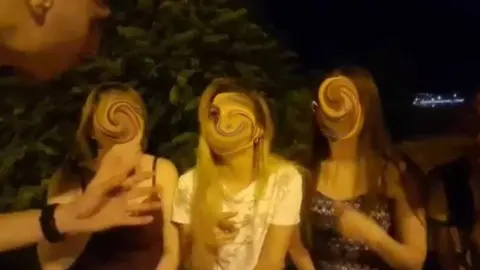 Screen-grab of an online video with three Russian women, their faces blurred