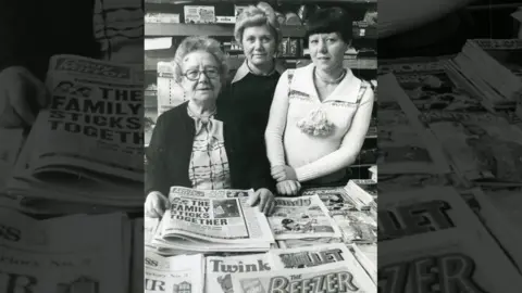 Cynthia Burgin Cynthia Burgin, pictured middle, in her family's shop