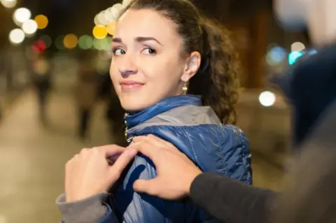 Getty Images Woman being harassed