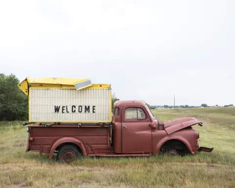 Martin Eberlen A broken down van with words on the side