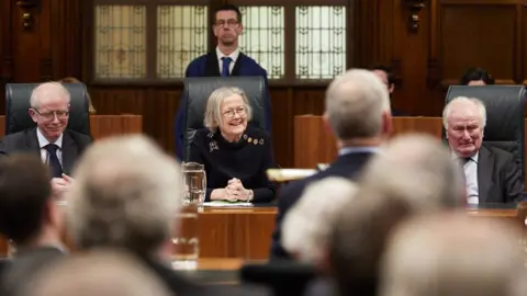 UK Supreme Court/Kevin Leighton Lord Reed on the left of Lady Hale at her valedictory sitting in the Supreme Court in December