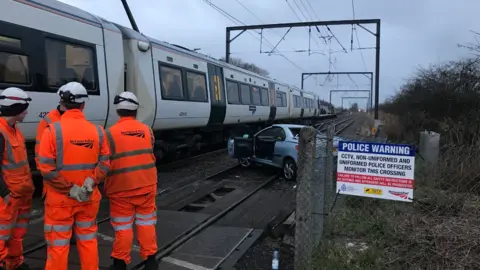 British Transport Police Car and train on tracks