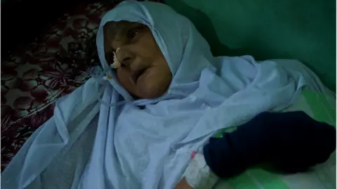 Shaheen Abdulla Sidhique Kappan's mother