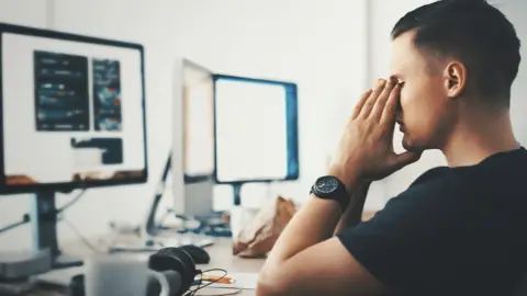 Getty Images Man at computer