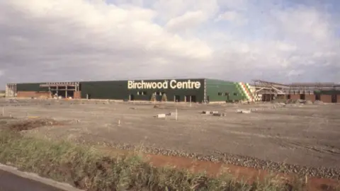 Reproduced courtesy of Cheshire Archives A historic photo showing a view of construction work on the Birchwood Centre.