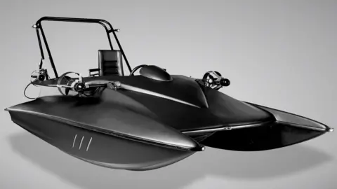 A black speed boat-like vessel.