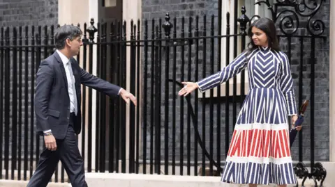 PA Media Conservative Prime Minister Rishi Sunak with his wife Akshata Murty leaving after giving a speech in Downing Street, London, following his party's landslide defeat to the Labour Party in the 2024 General Election.