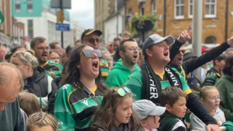 James Burridge/BBC Fans cheering during the Northampton Saints celebratory parade
