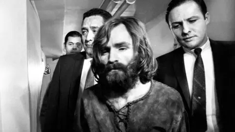 Getty Images Charles Manson leaves court in 1969