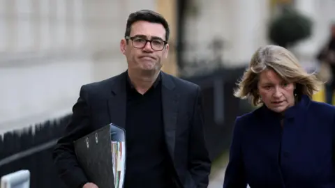 Reuters Mayor of Greater Manchester Andy Burnham outside a London building