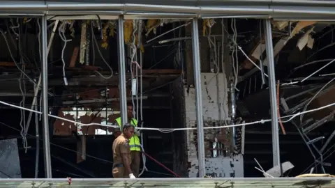 AFP Blast damage at the Shangri-La hotel in Colombo