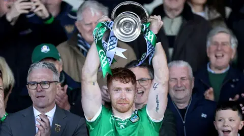 Cian Lynch lifts the cup