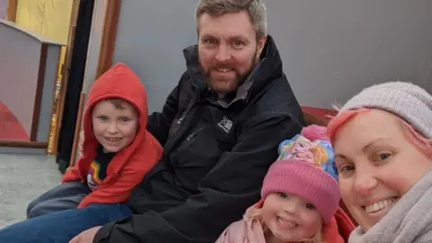 FAMILY PHOTO Photos from 42 year old Lou Kennedy from Caerphilly, whose 4 year old Mya (correct) has Downs Syndrome.