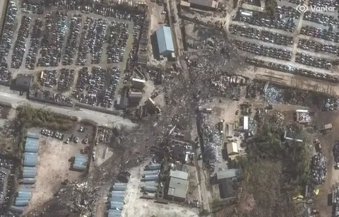 Satellite image ©2025 Vantor An aerial view of an industrial area in Louisville, Kentucky, after the cargo plane crash.