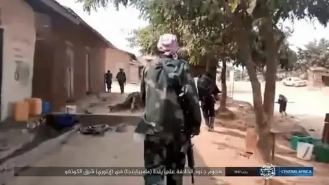 Islamic State propaganda IS video of militants in the aftermath of an attack on a village in Ituri province