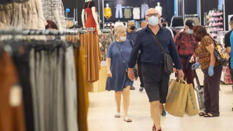 PA Media Shoppers in Primark on London's Oxford Street when shops reopened in June 2020