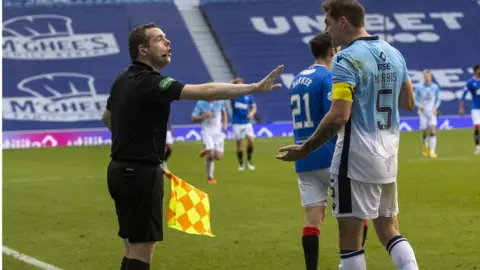 PA Media Douglas Ross refereeing