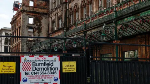 A sign on the cordon around the building site at Gordon Street.