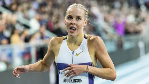Keely Hodgkinson celebrates breaking the indoor 800m world record