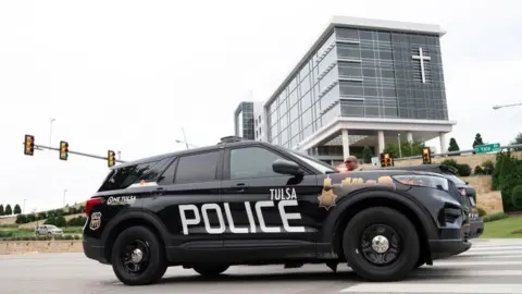 Getty Images Police respond to the scene of Wednesday's shooting at St Francis Hospital